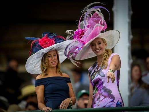 Women in big hats at the Kentuck Derby