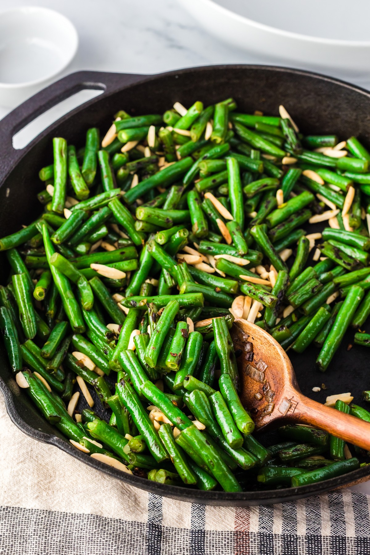 green bean almandine in cast iron skillet