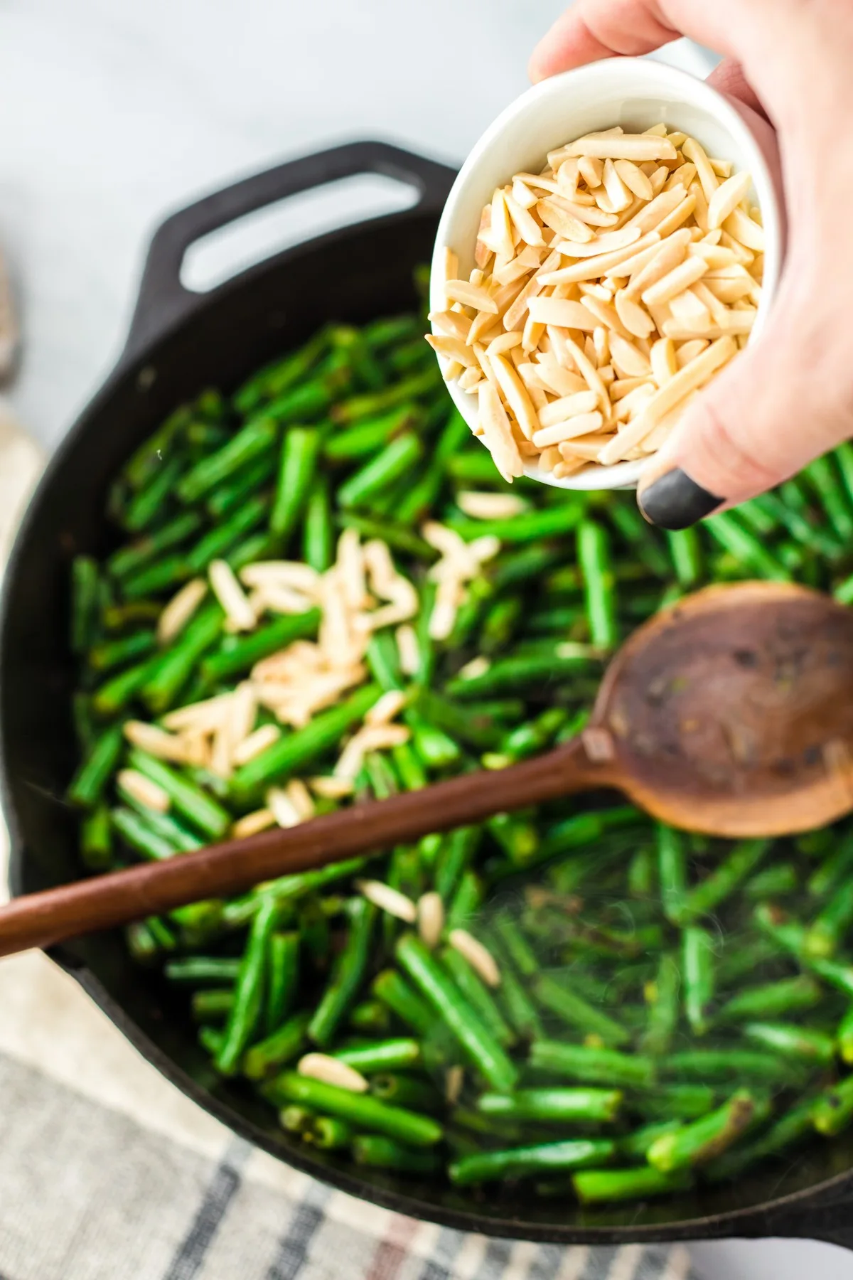 adding toasted almonds to green beans