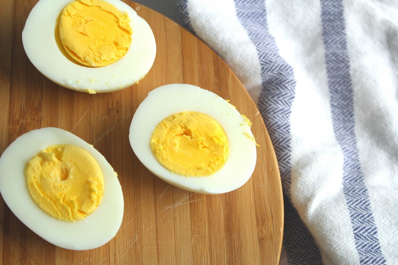 Egg halves on cutting board