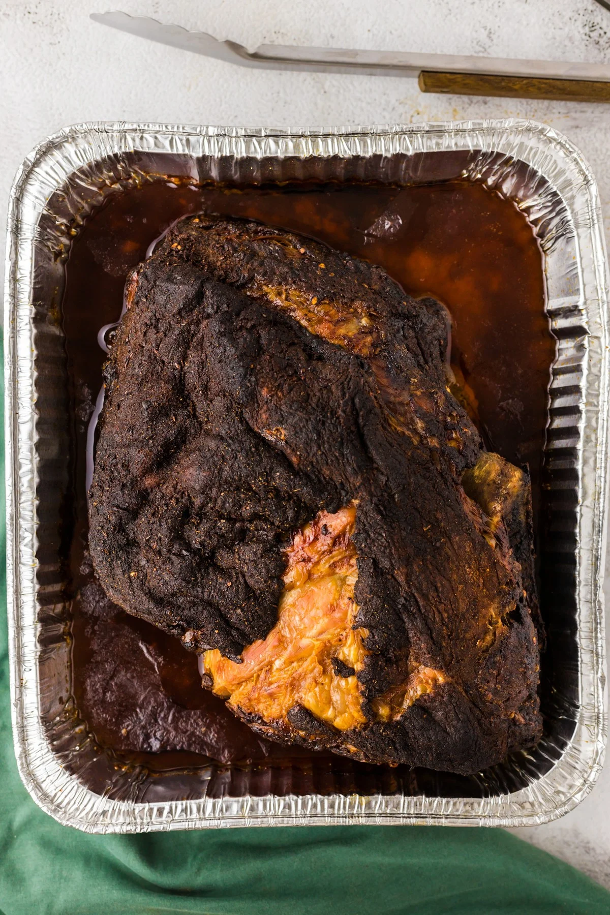 Whole Pork Shoulder Cooked in Roasting Pan