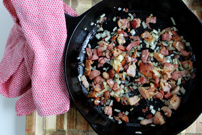 Cast iron skillet of bacon and onion