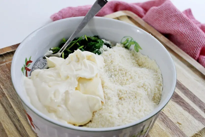 Ingredients in bowl for Baked Spinach and Artichoke Dip