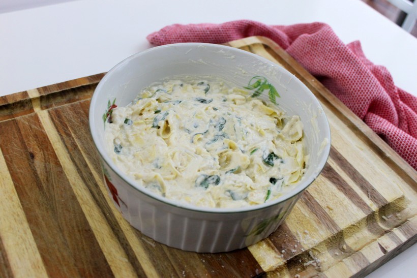 Mixed ingredients for Baked Spinach and Artichoke Dip unbaked