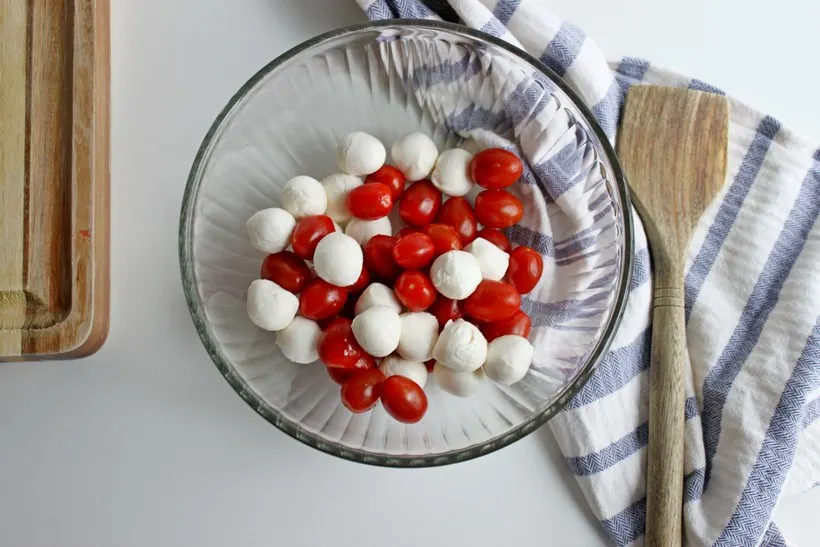 Mozzarella balls and tomatoes in bowl