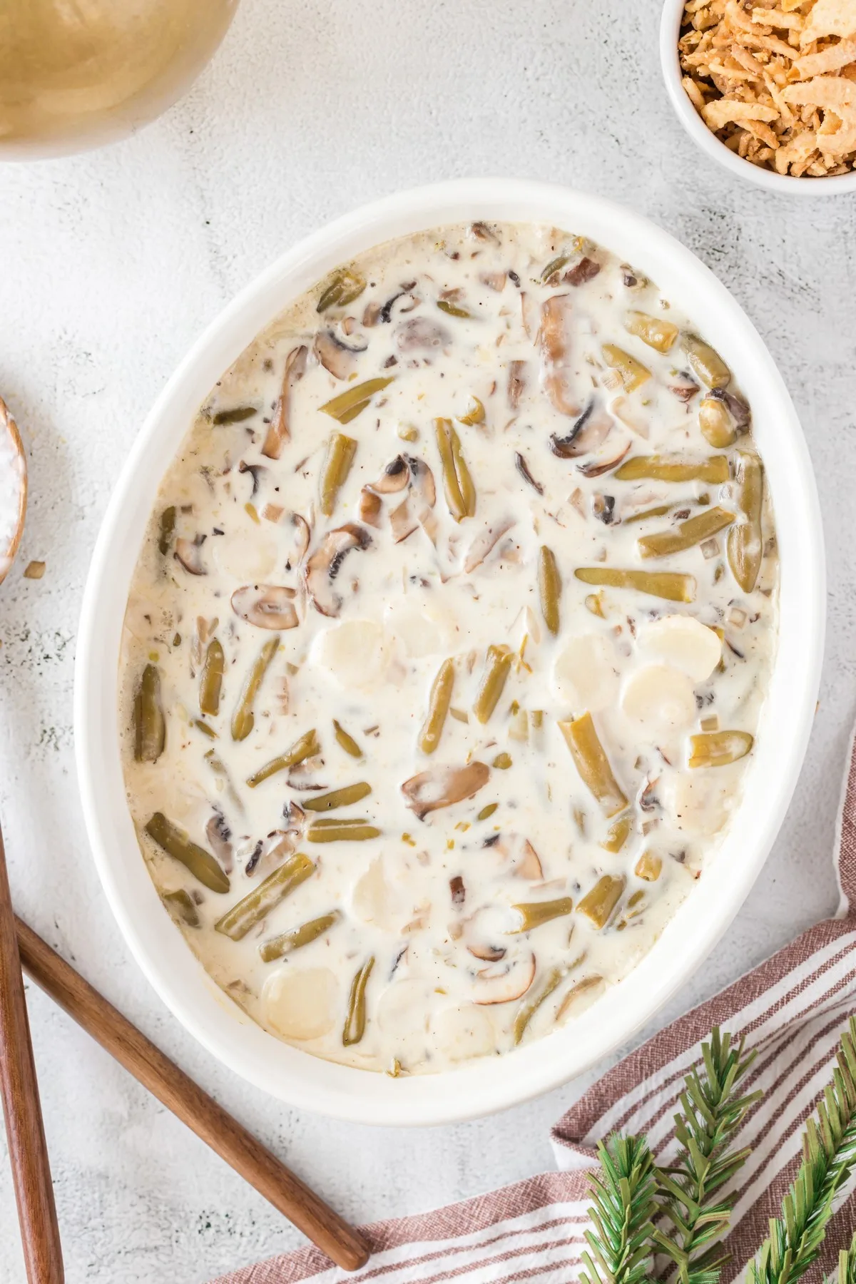 green bean casserole mixture in casserole dish
