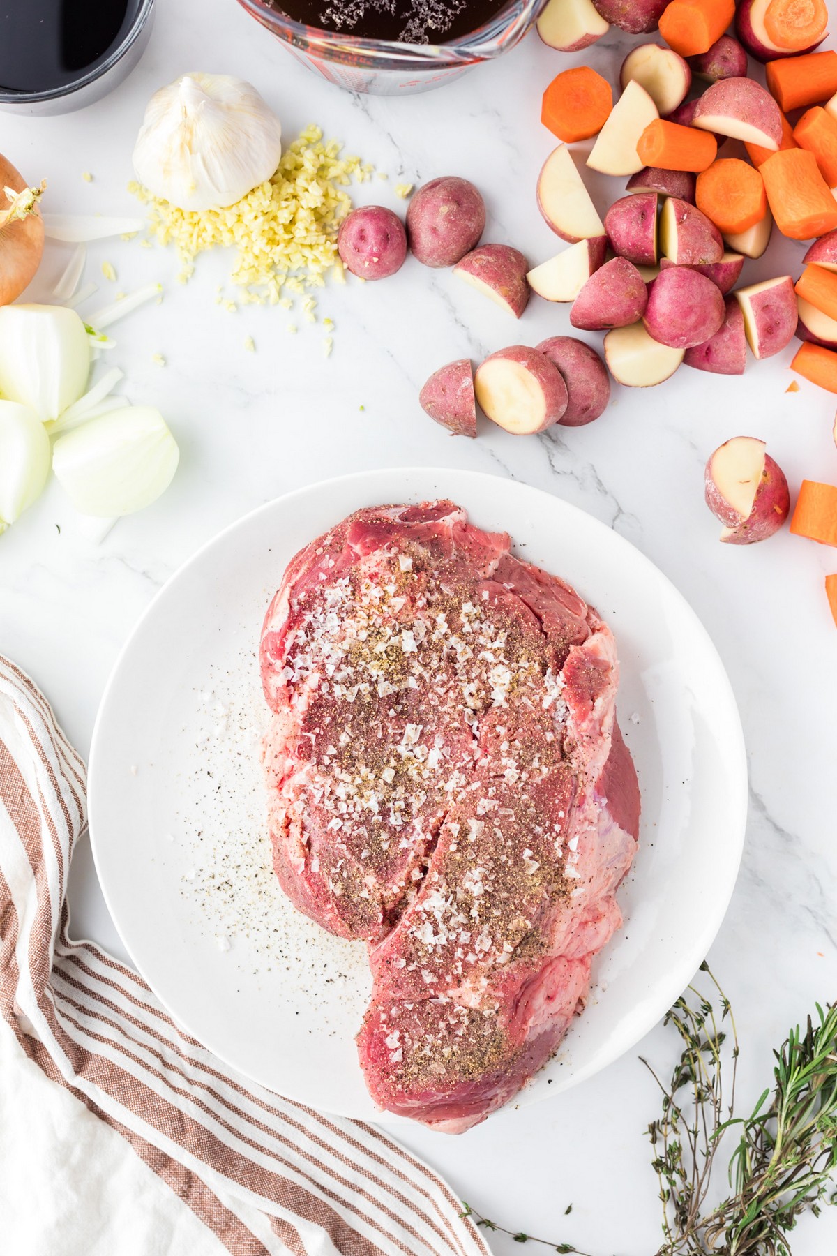 seasoned chuck roast on white plate