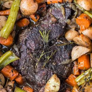 pot roast surrounded by vegetables