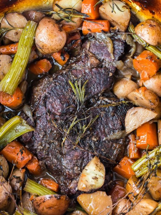 pot roast surrounded by vegetables