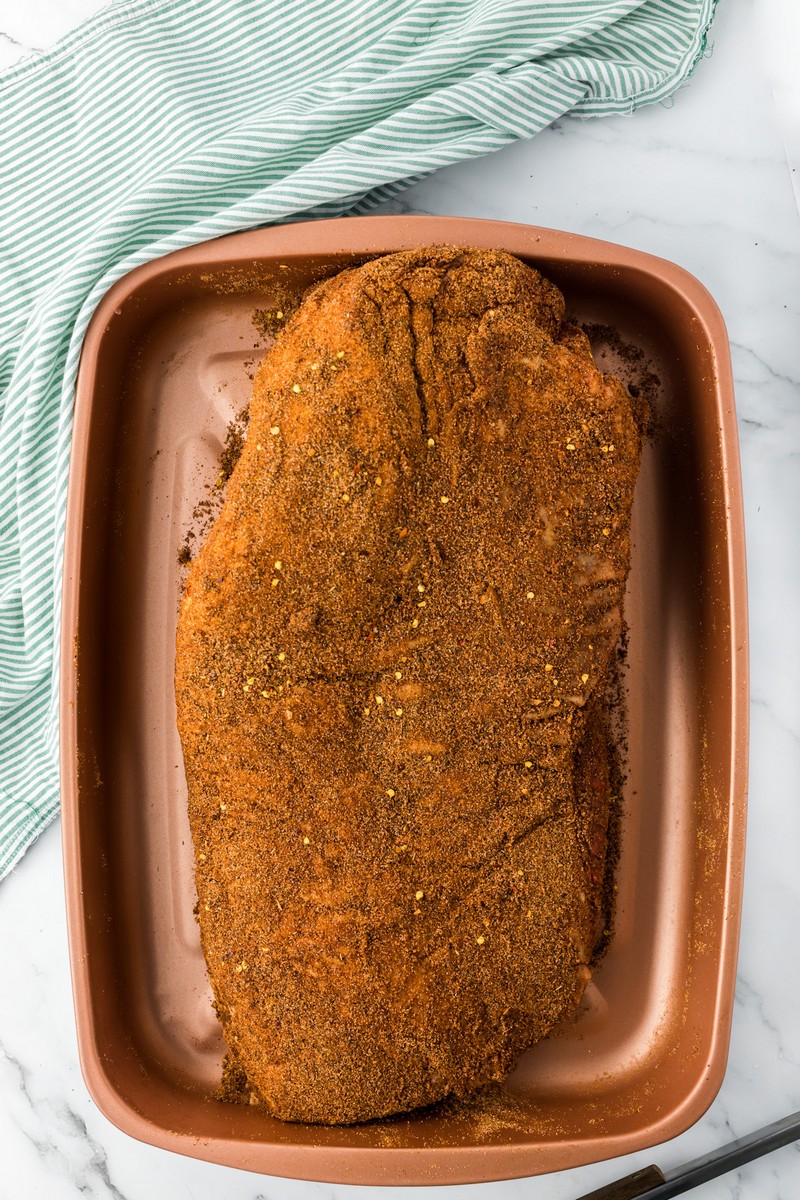 whole brisket coated in dry rub