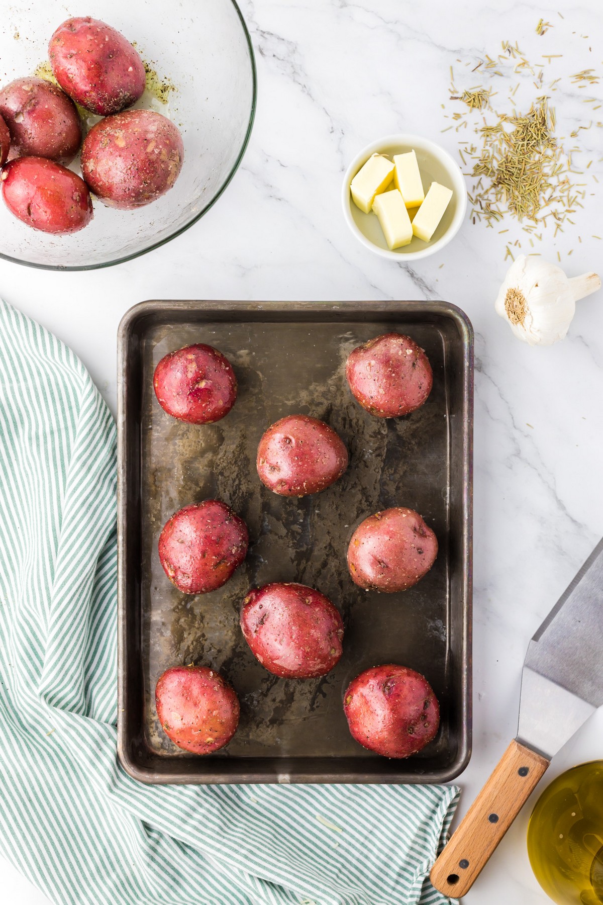 red potatoes on baking sheet