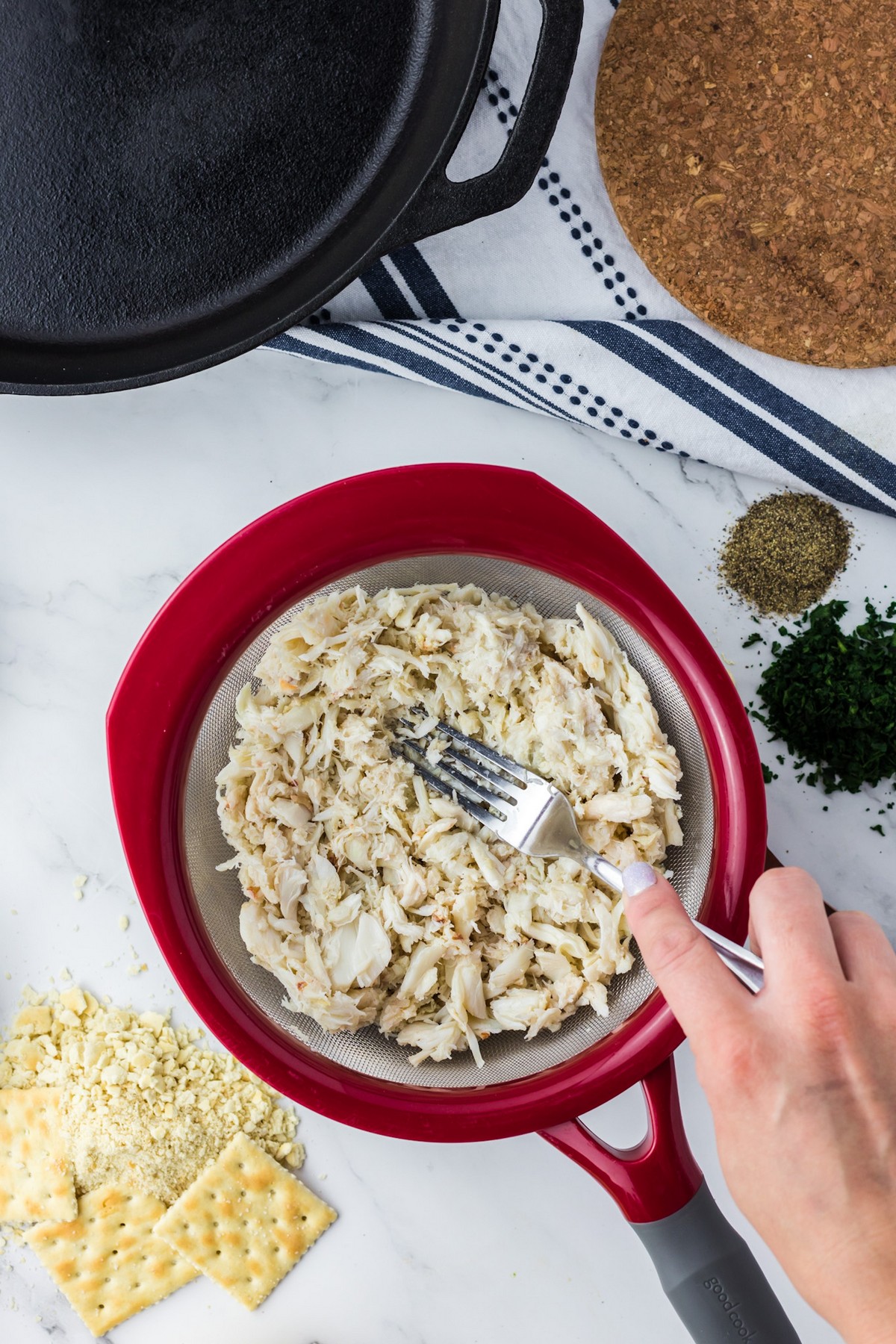 flaking crab meat with fork