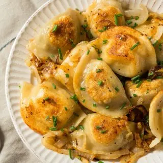 Potato dumplings on a white plate