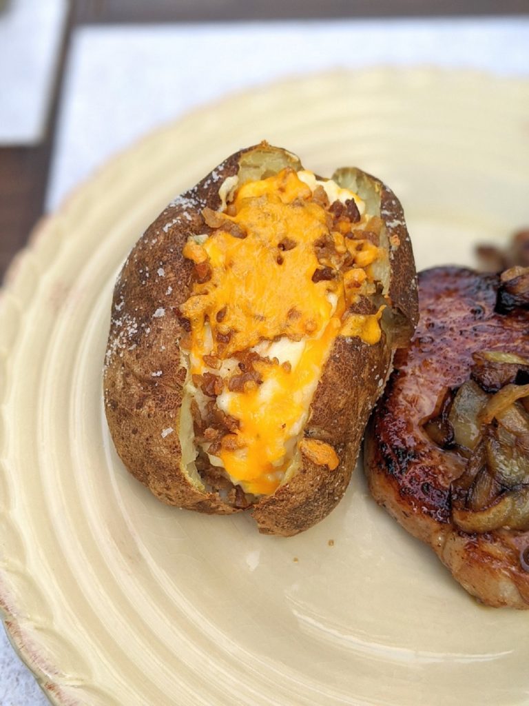 Twice baked potato on a plate