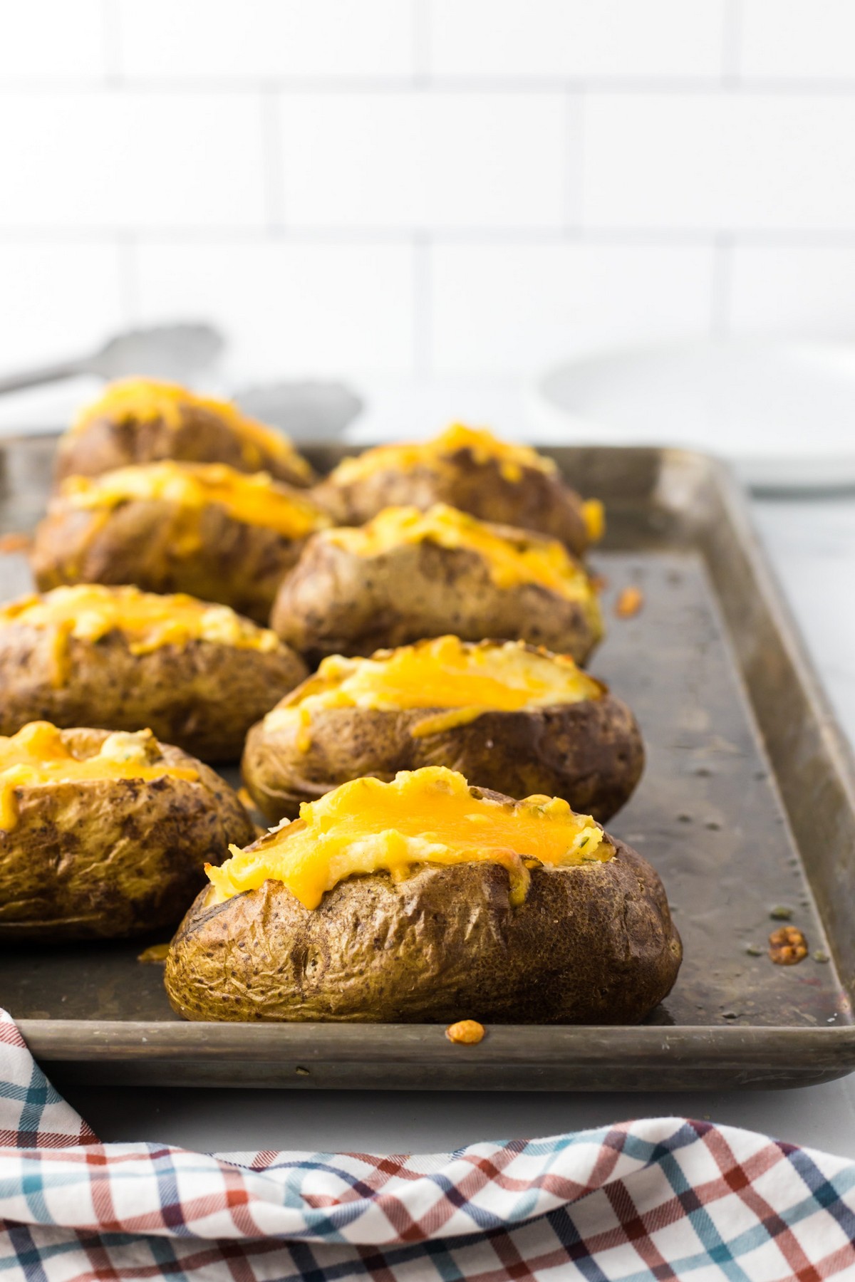 twice baked potatoes on baking sheet