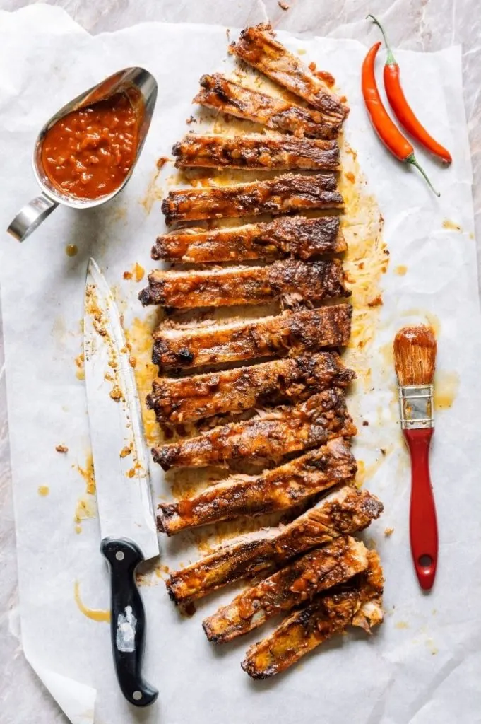 bbq ribs with basting brush vertical shot