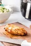 air fryer chicken breast on cutting board