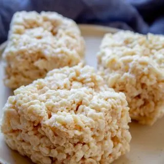 rice krispie treats with blue towel in background