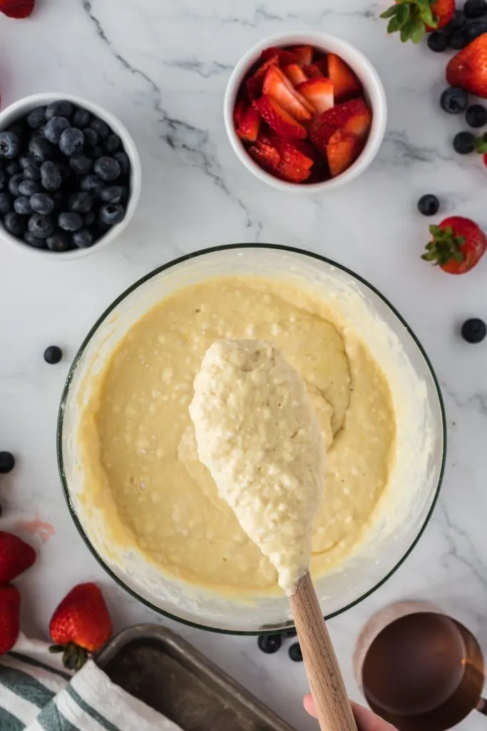 mixing pancake batter in glass bowl