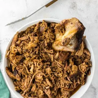 shredded pork shoulder in white dish