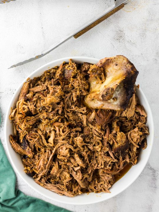 shredded pork shoulder in white dish