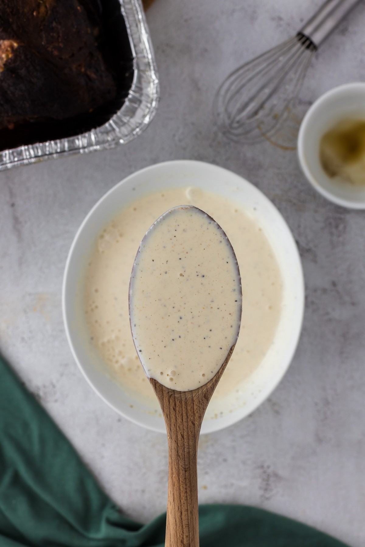 spoon of white sauce