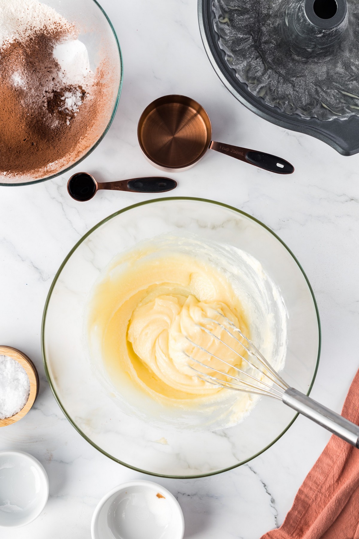 whisking wet ingredients in bowl