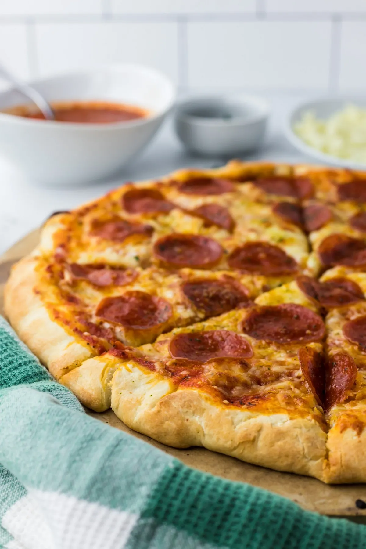 whole pepperoni pizza sliced