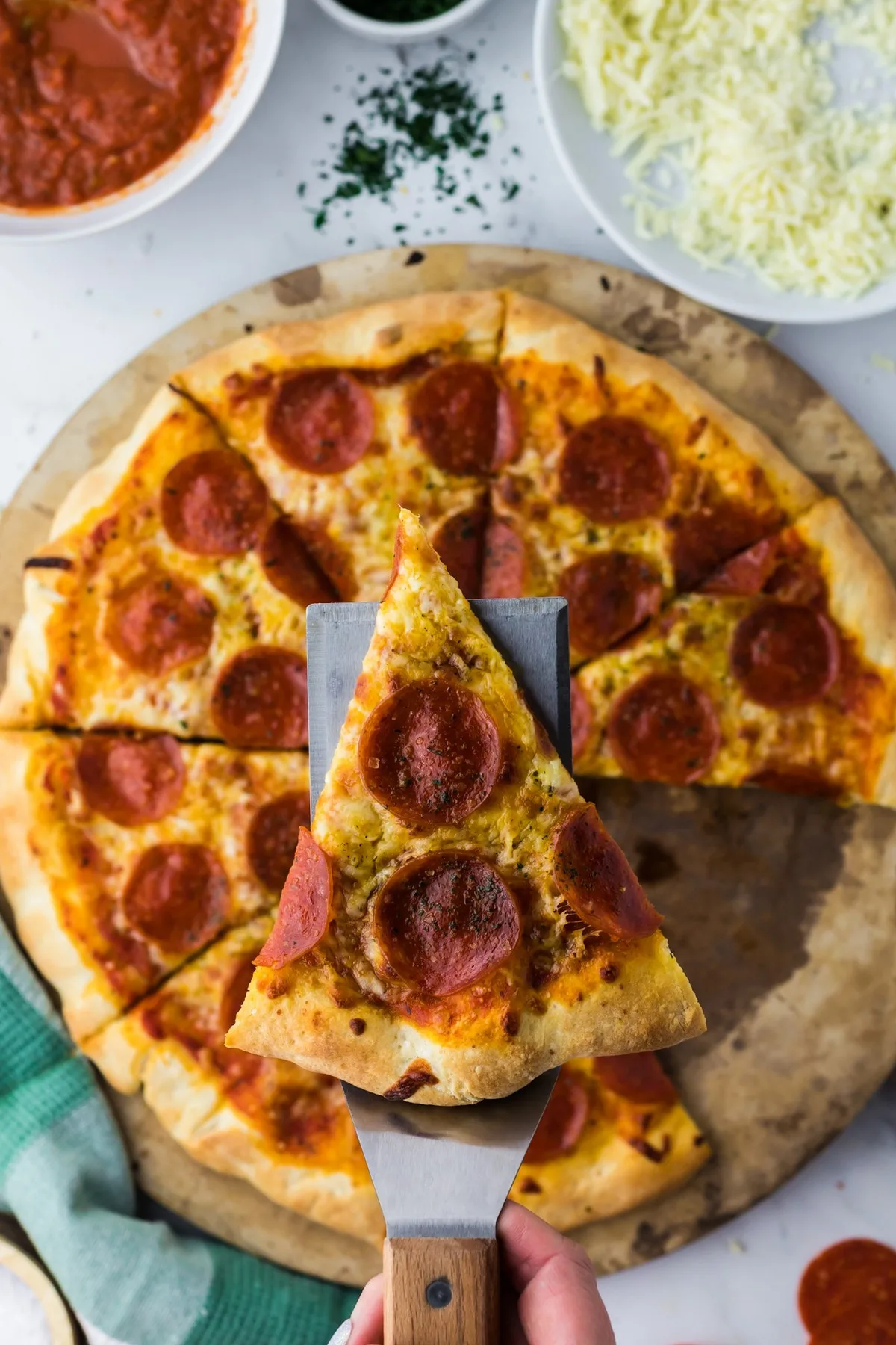 slice of pizza on spatula