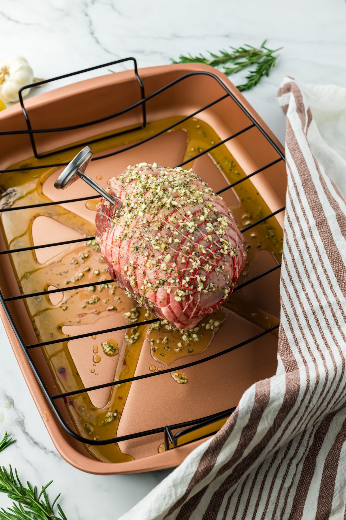 leg of lamb in roasting dish