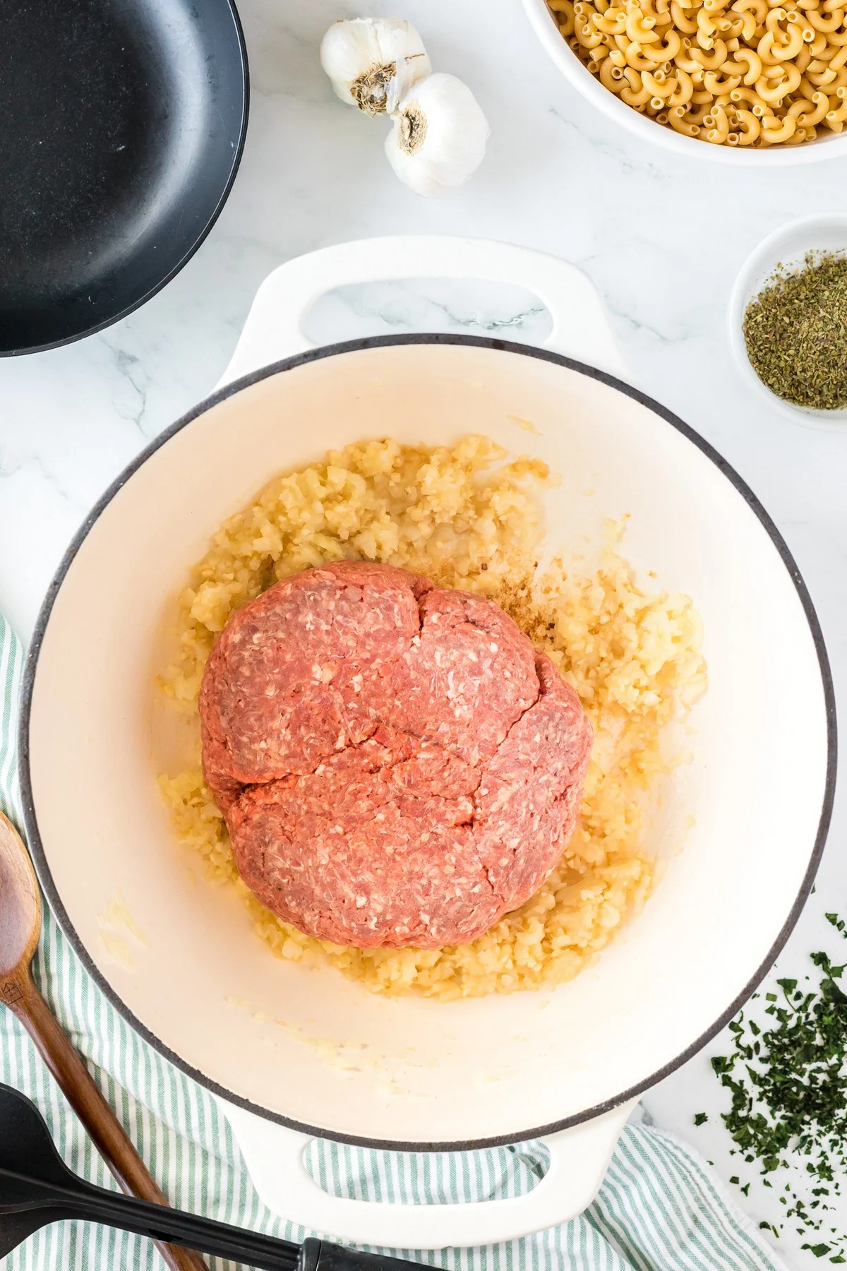 browning ground beef and onion in dutch oven