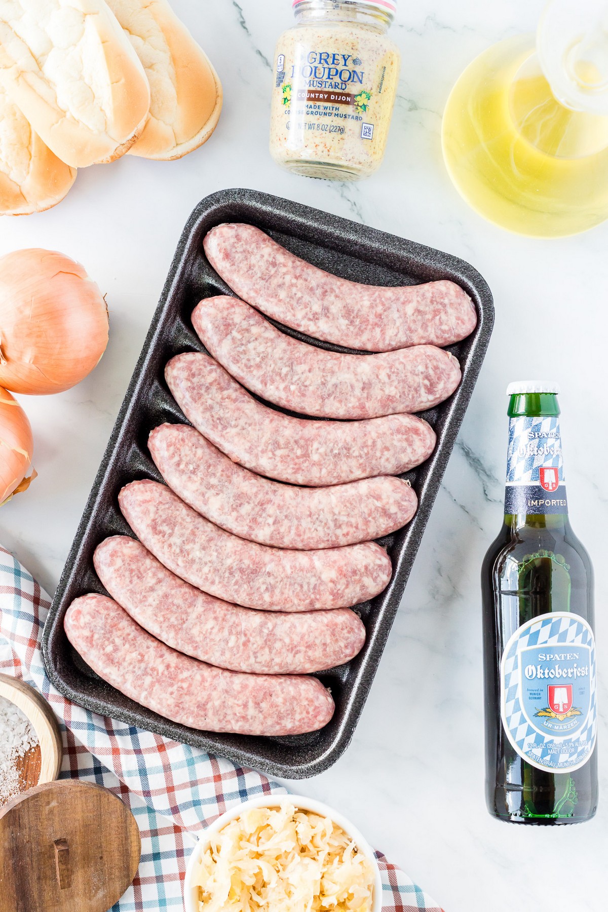ingredients for beer brats, pack of brats with bottled beer