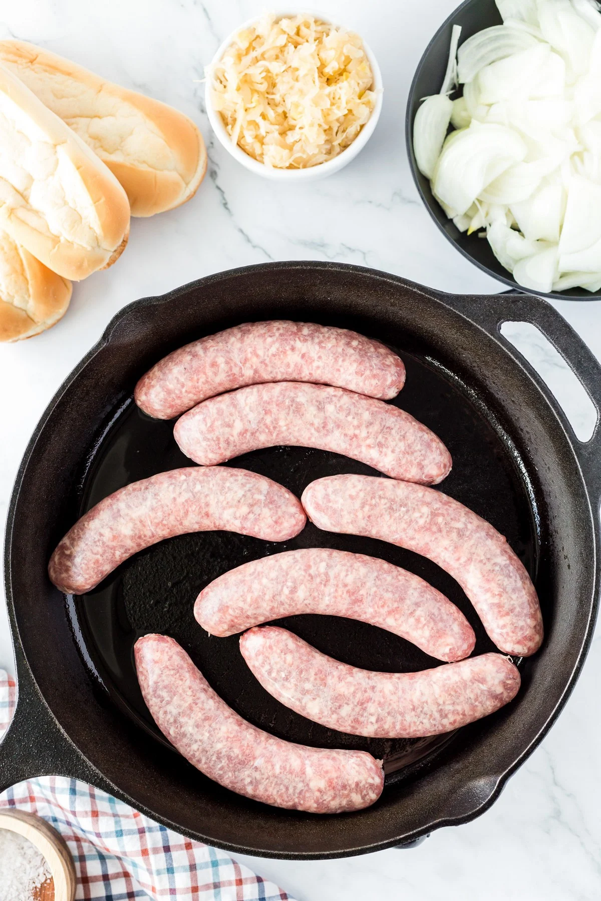 searing brats in cast iron pan