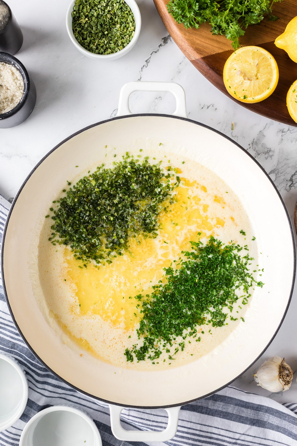 herbs and butter in saucepan