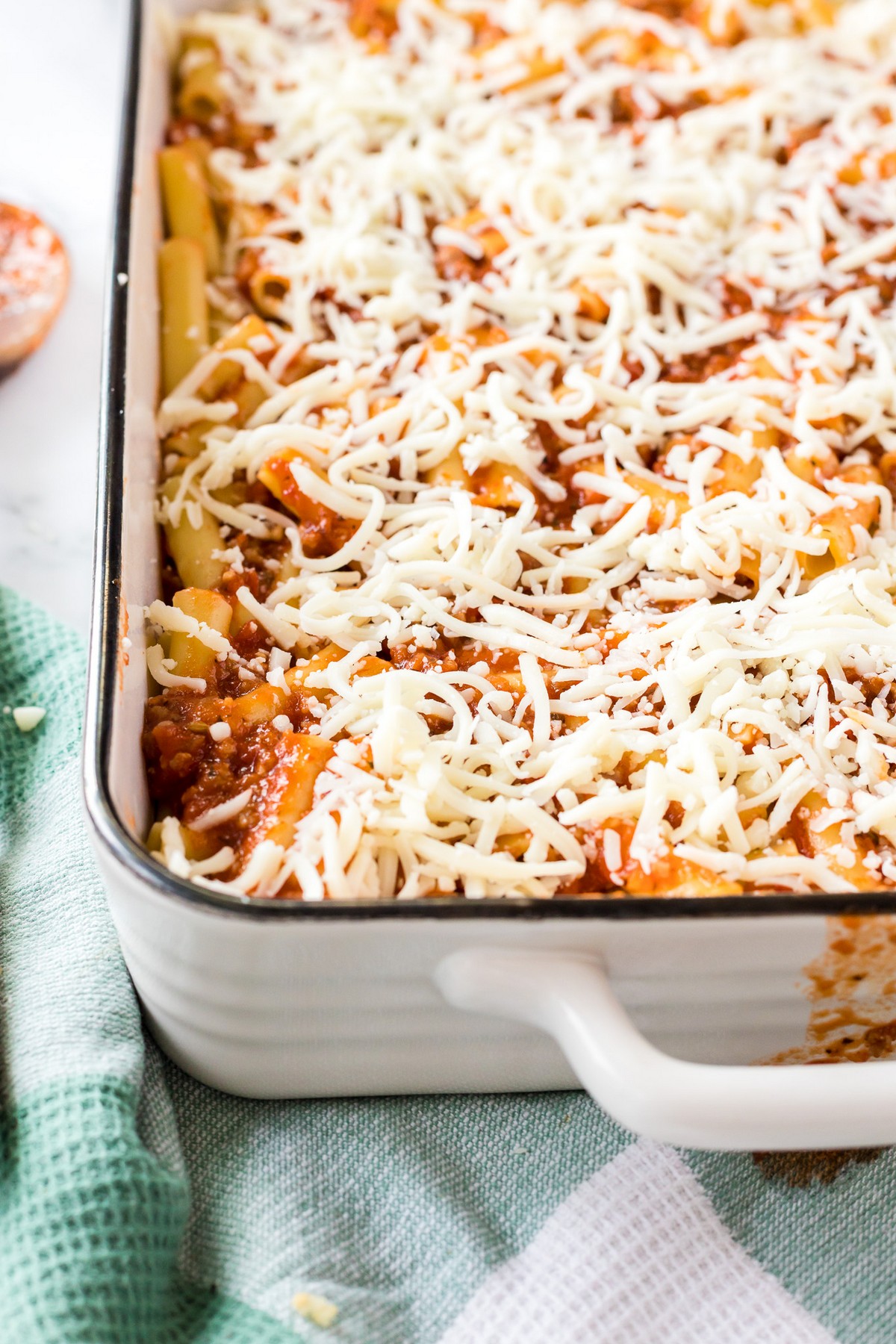 uncooked baked ziti in casserole dish