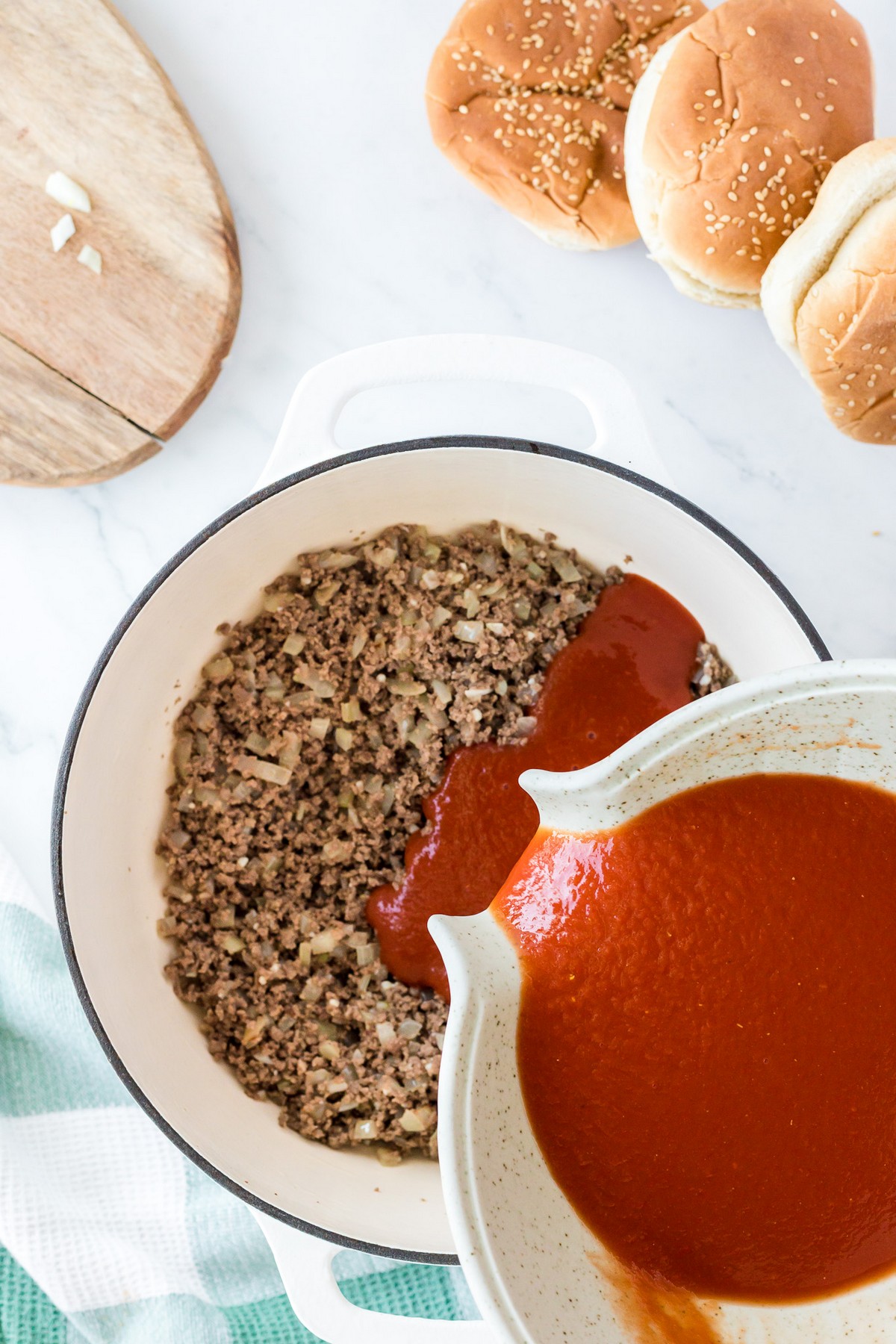 making sloppy joe mixture with meat and sauce