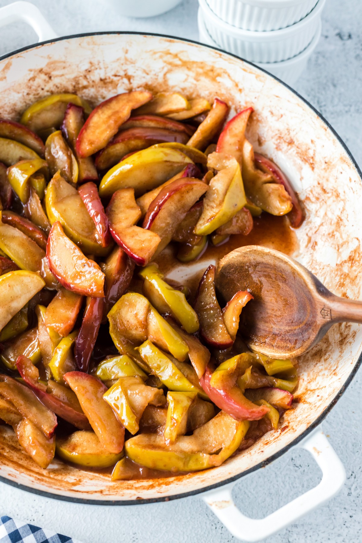 baked cinnamon apples stirring