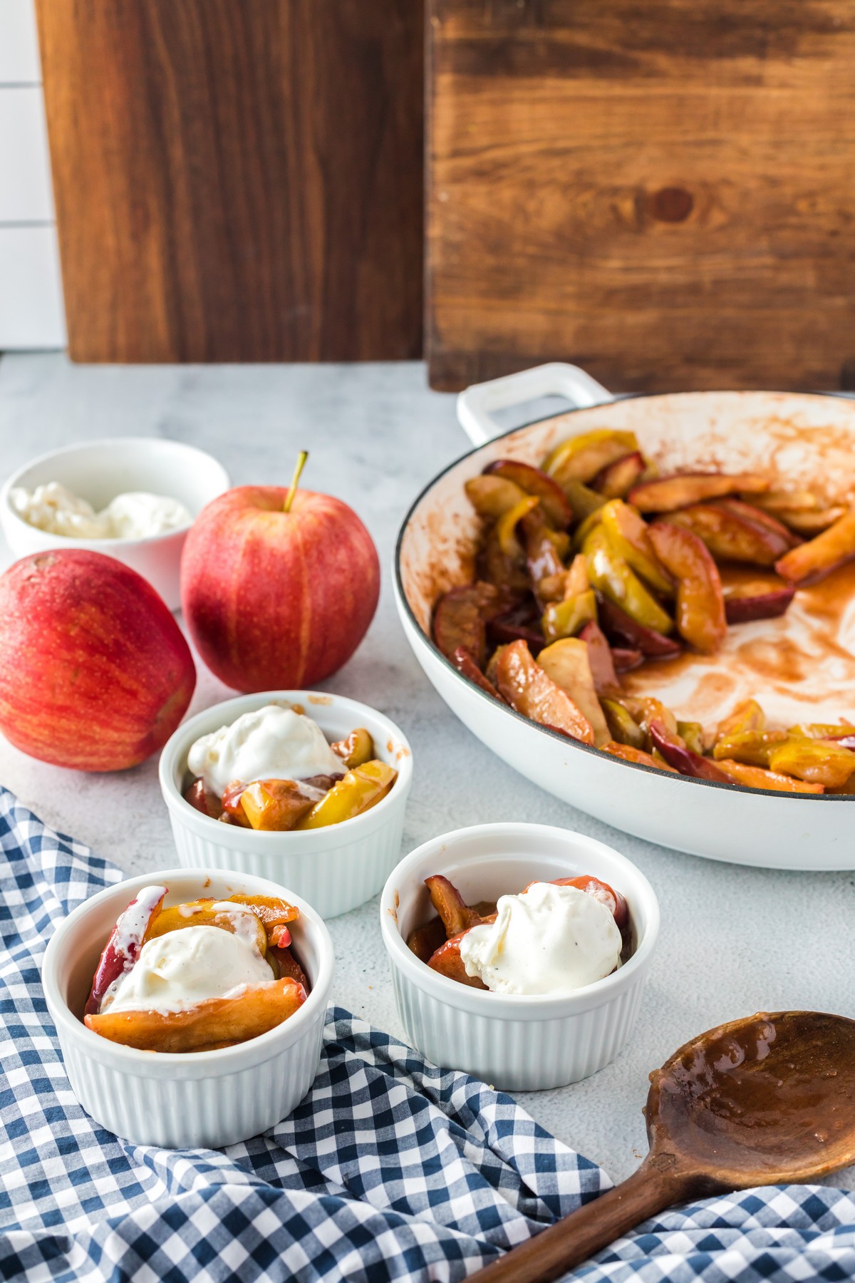 baked apples with serving dishes and apples