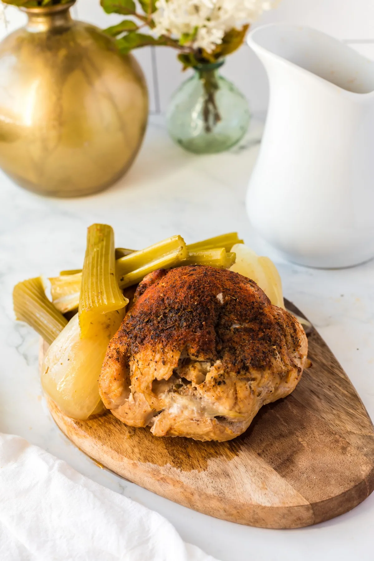 cooked turkey breast on cutting board