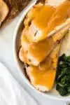 slow cooked turkey breast with gravy and sides pin image