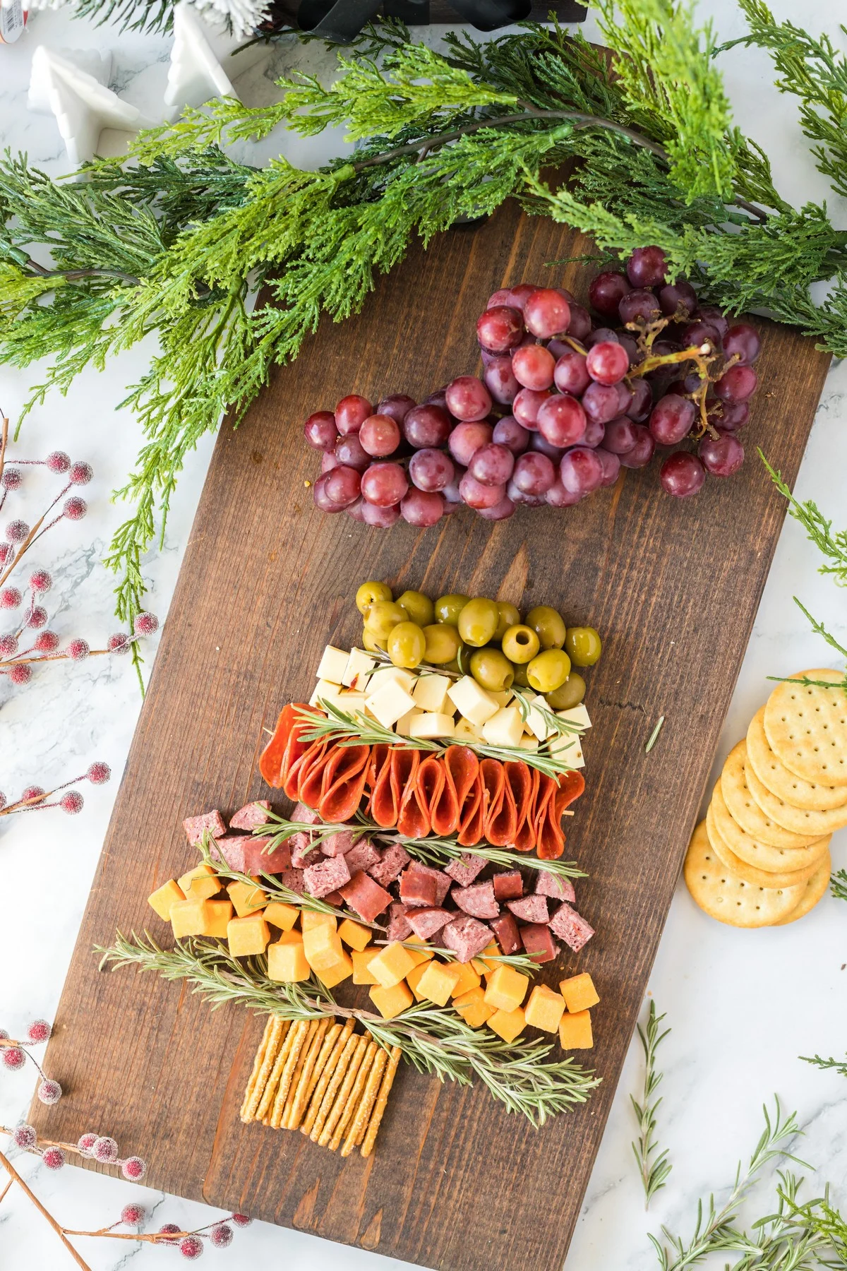 finishing the christmas tree shape of the Christmas Charcuterie Board