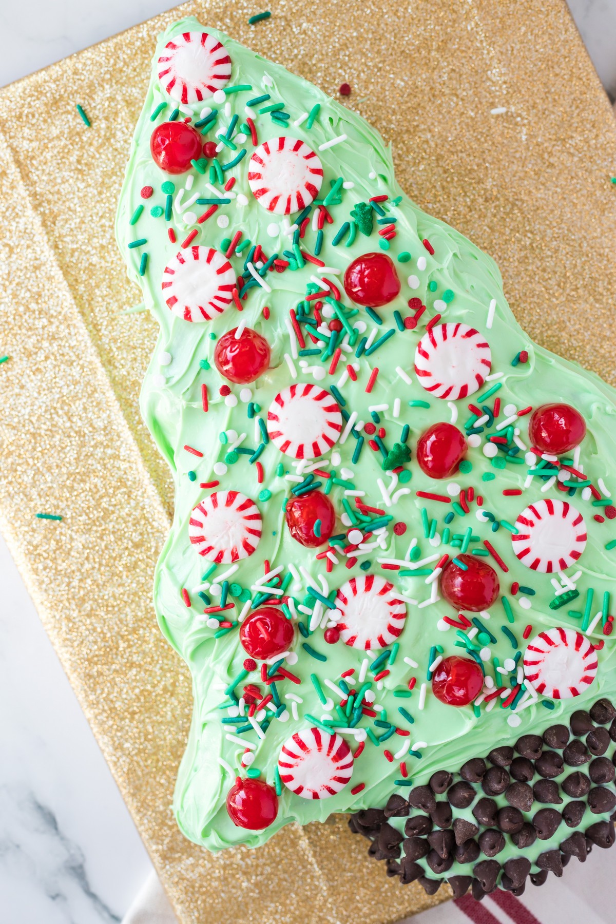 angled photo of christmas tree shaped cake