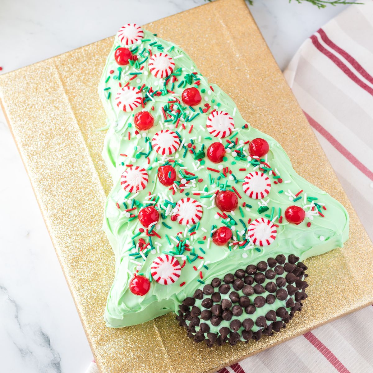 https://www.southerncravings.com/wp-content/uploads/2022/10/Christmas-Tree-Cake-Featured-Image.jpg