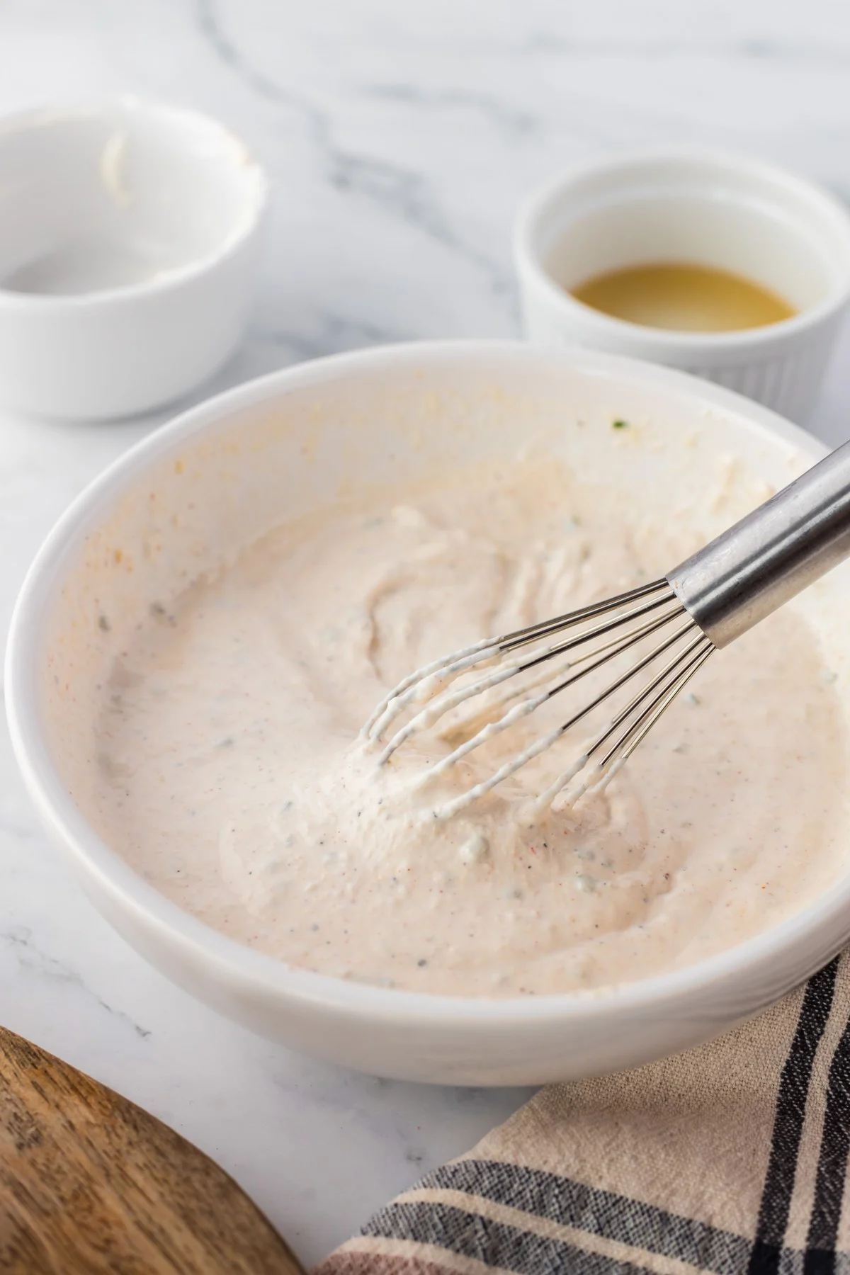 whisking horseradish sauce