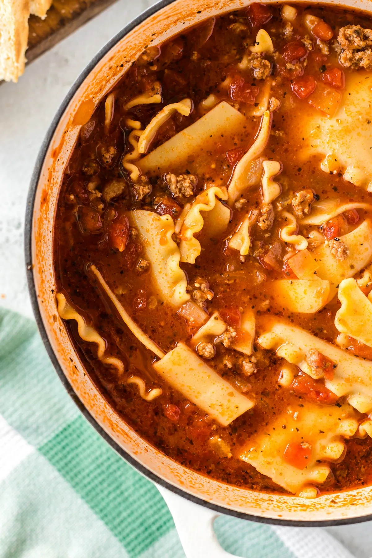 adding pasta to lasagna soup