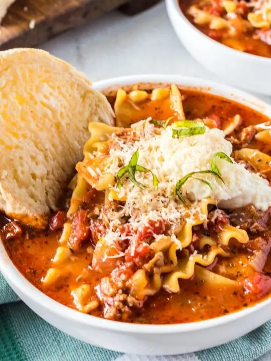 Lasagna soup in a bowl with bread featured image