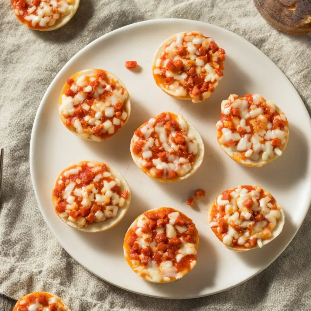 frozen mini bagel pizzas on white plate