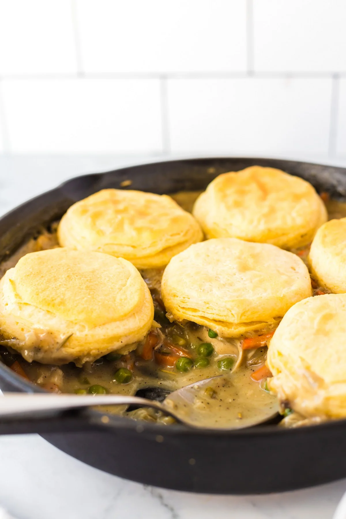 serving chicken pot pie in cast iron skillet