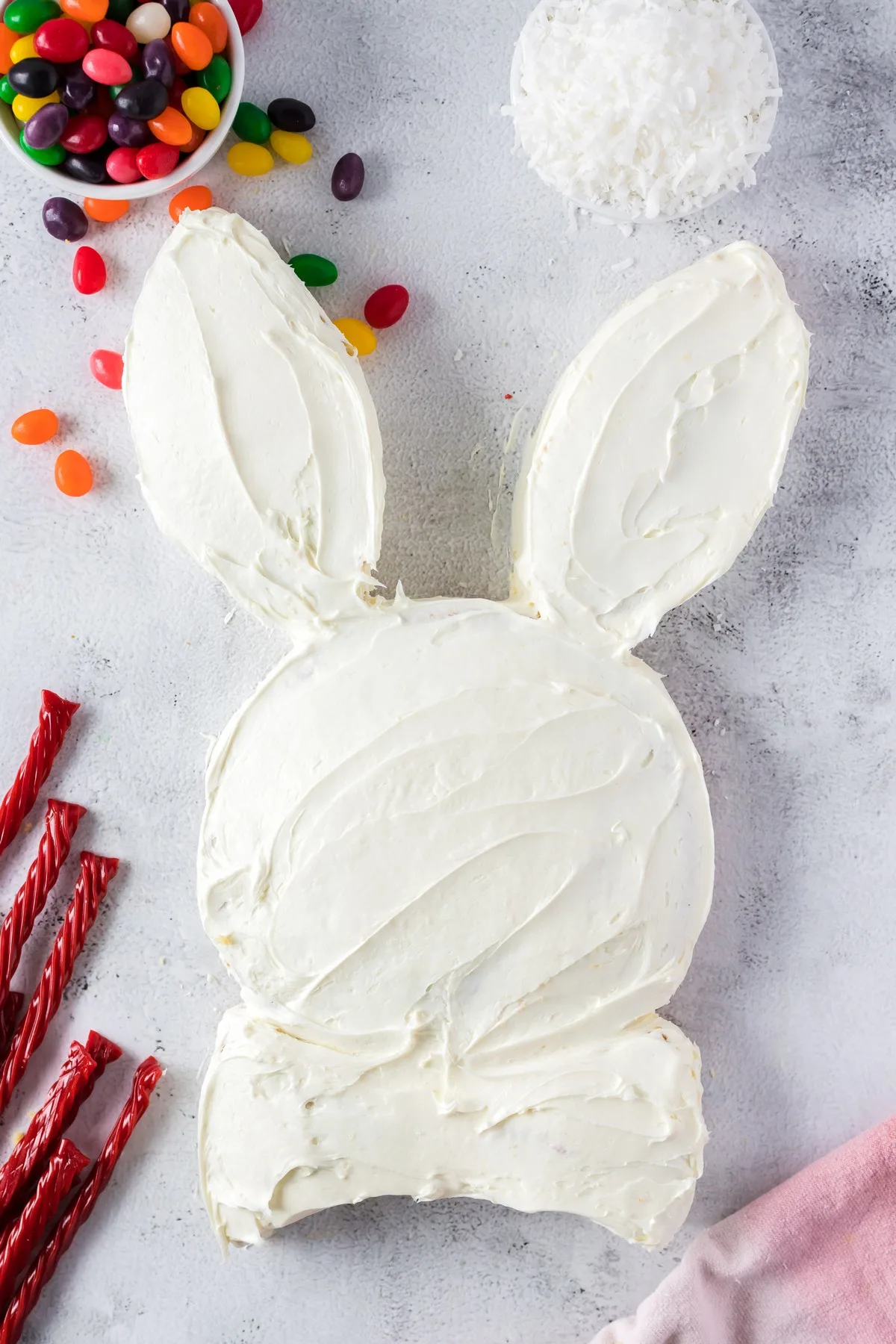 white icing over easter bunny cake