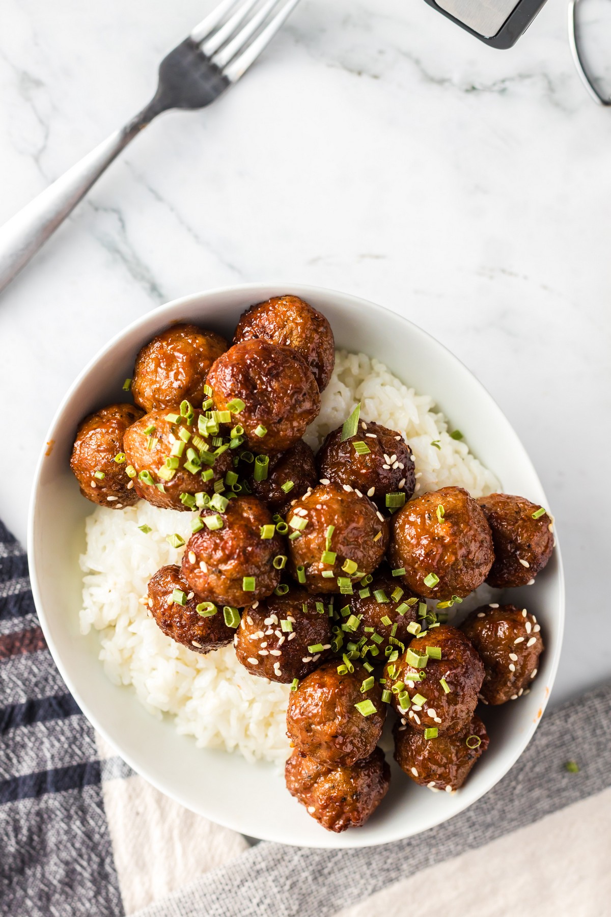 teryaki meatballs over white rice